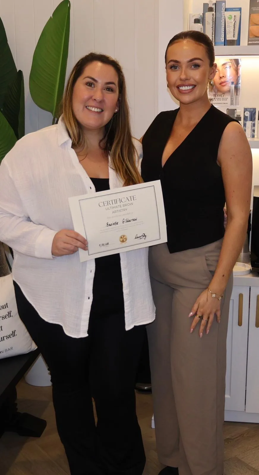 Ciara Daly Academy — student receiving beauty training certificate in Sydney